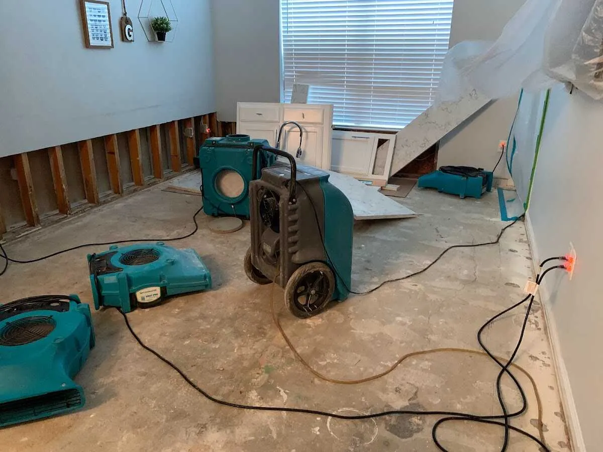Dehumidifier in flood-cut room for Water Damage Restoration in Woods Cross
